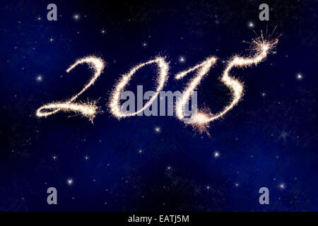 2015 in Fireworks o botti contro il cielo notturno con stelle per celebrare il nuovo anno. Foto Stock