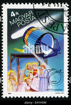 Ungheria - circa 1986: timbro stampato da Ungheria, mostra cometa di Halley, Agenzia spaziale europea Giotto, i tre Re Magi, arazzo da Foto Stock
