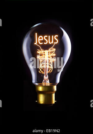 La religione e la fede in un concetto di lampadine a filamento. Foto Stock