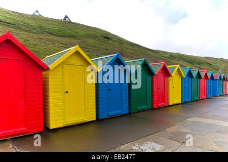 Cabine sulla spiaggia, Whitby Foto Stock