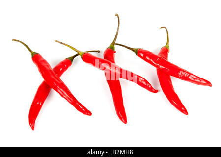 Sei lucido freschi peperoncini rossi in forma di triple X Foto Stock