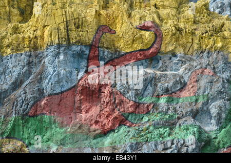 Mural de la Prehistoria un gigantesco murale dipinto su una scogliera in Vinales area di Cuba. Foto Stock