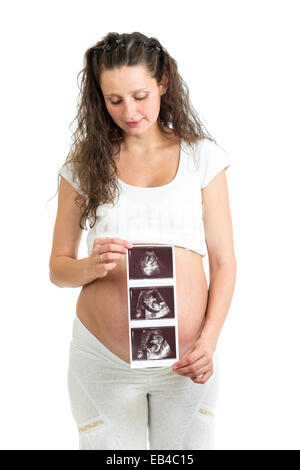 La donna incinta è in possesso la sua ecografo Foto Stock