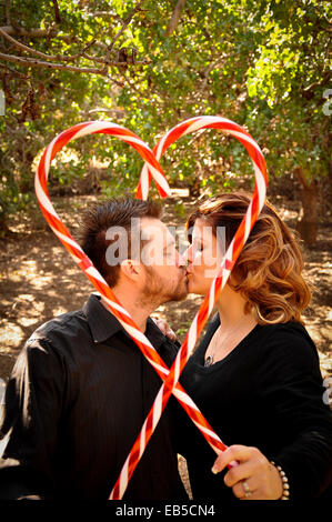 Natale amore con candy cane cuore Foto Stock