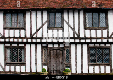 Inglese a struttura mista in legno e muratura in bianco e nero in stile Tudor case da Lavenham, Suffolk in Inghilterra Foto Stock