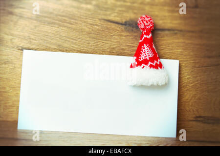 Felice Natale carta con vuoto di carta bianca Foto Stock