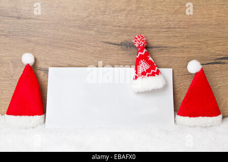 Felice Natale carta con vuoto di carta bianca Foto Stock