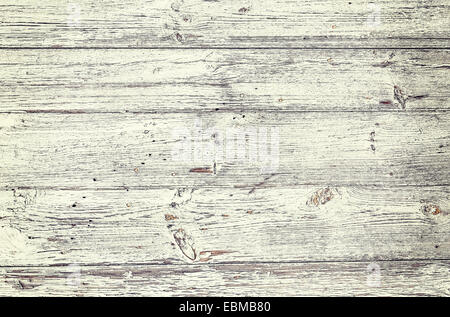 Vecchio di tavole di legno con la vernice che si stacca dal fondo. Foto Stock