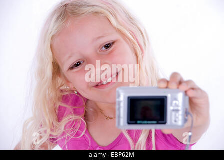 Ragazza con digicam Foto Stock