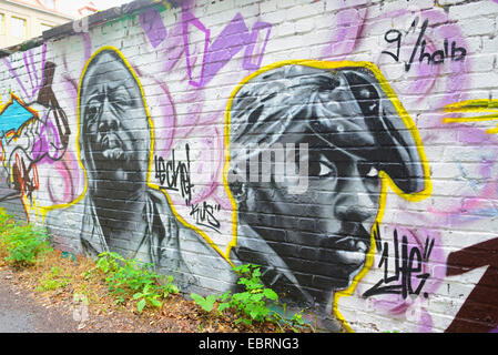 Volti come un graffiti, in Germania, in Baviera, Stein Foto Stock