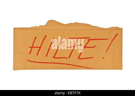 Segno di cartone di una persona senza dimora con la scritta 'Hilfe!" ("Aiuto!") Foto Stock