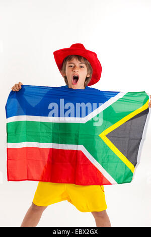 Tifoso di calcio alla coppa del mondo di calcio 2010 in Sud Africa con South African bandiera Foto Stock