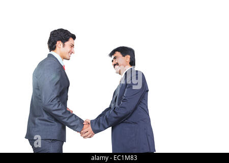 Due indiani Business man mano tremante Foto Stock