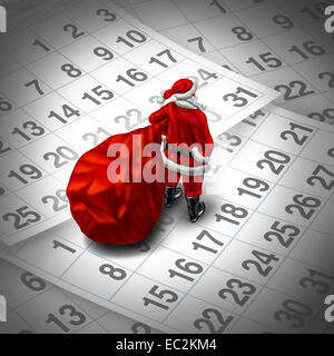 Il tempo di Natale il concetto di vacanza come Babbo Natale con una borsa regalo permanente sulla parte superiore di un gruppo del mese calendario fogli come un inverno Foto Stock