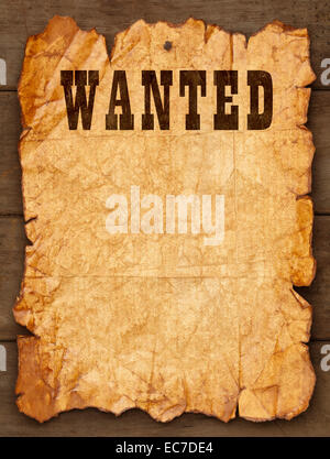 Manifesto Wanted imbastito su pannelli di legno con copia spazio. Foto Stock