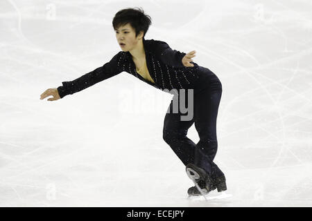 Barcellona, Spagna. 12 dic 2014. Shoma Onu dal Giappone le prestazioni durante le junior uomini pattinaggio gratuito presso l'ISU Grand Prix di Pattinaggio di Figura Final & Junior Grand Prix finale di Barcellona, Spagna, il 12 dicembre, 2014. Credito: Pau Barrena/ZUMA filo/Alamy Live News Foto Stock