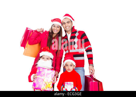 Indian presenta con bambini shopping di Natale Foto Stock