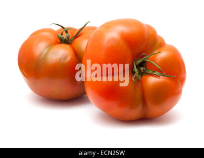 Grande massa-pomodori cresciuti isolato su bianco Foto Stock