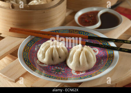 Char siu ciambelle. Dim Sum. Gnocchi cinesi. Foto Stock