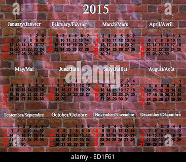 Calendario per il 2015 anno in inglese e in francese sul lilla scuro dello sfondo Foto Stock
