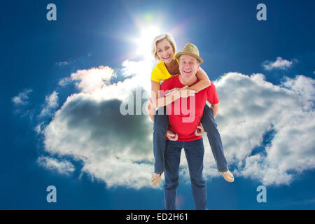 Immagine composita della coppia matura scherzando sulle insieme Foto Stock
