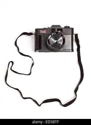 La rivista Time regalo in plastica fotocamera su sfondo bianco Foto Stock