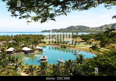 Waterfront bungalows, South Seas, Plantation Island o Malolo Lailai, Isole della Mamanuca, Isole Figi Foto Stock