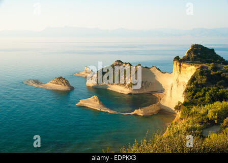 Cape Drastis al tramonto, l'isola di Corfù, Grecia Foto Stock