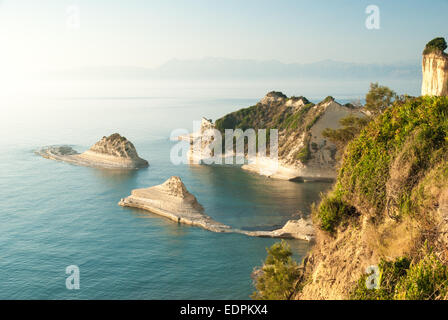 Cape Drastis al tramonto, l'isola di Corfù, Grecia Foto Stock