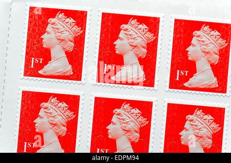 Red britannico first class royal mail francobolli Foto Stock