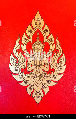 Pittura tailandese sul tempio della parete in Thailandia (maschio angel design) Foto Stock