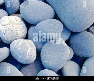 Disco ciottoli closeup sulla spiaggia Foto Stock
