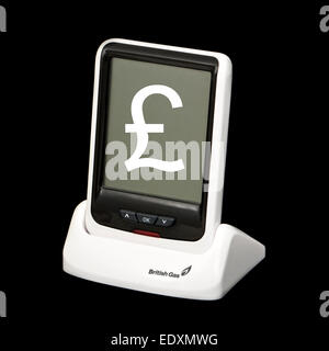 British Gas smart meter (tempo reale elettricità monitor) con £-segno sovrapposto sullo schermo Foto Stock