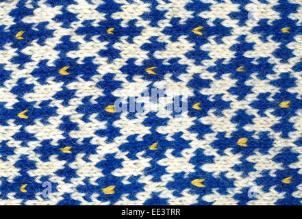 La lana colorata in stretta fino, prodotto tessile sfondo.background pattern di folklore lana texture sfondi a colori calore pat tessili Foto Stock