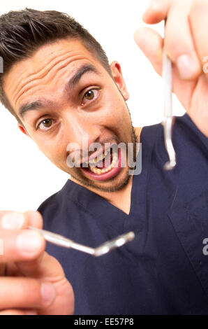 Closeup ritratto dentista maschio dal paziente. dal punto di vista Foto Stock