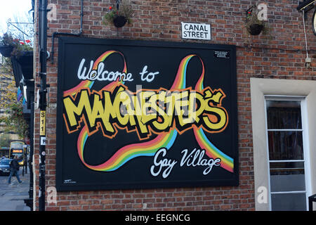 Benvenuti a Manchester il villaggio gay sign in Canal Street, Manchester. Foto Stock