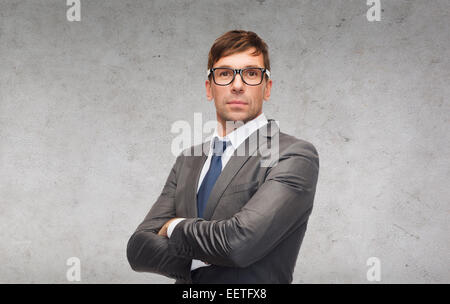 Imprenditore attraente o un insegnante in bicchieri Foto Stock