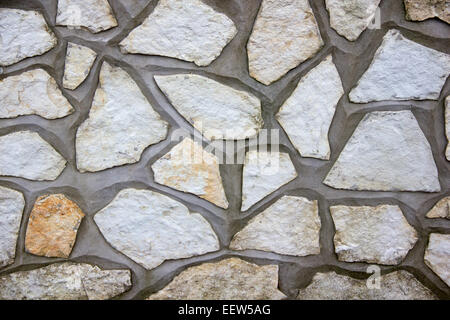 Parete in cemento e pietra vista ravvicinata Foto Stock