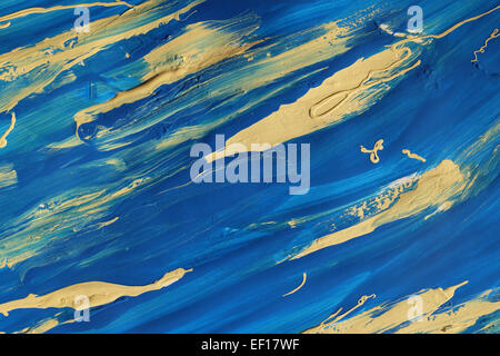 Bold abstract blu e giallo le macchie di vernice su carta, texture di sfondo Foto Stock