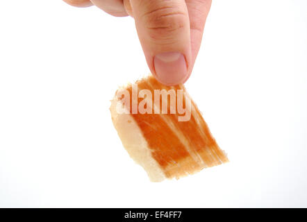 Uomo in possesso di un prosciutto Serrano slice. Jabugo. Le tapas spagnole Foto Stock