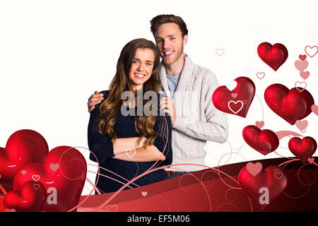 Immagine composita del ritratto di sorridere coppia giovane Foto Stock