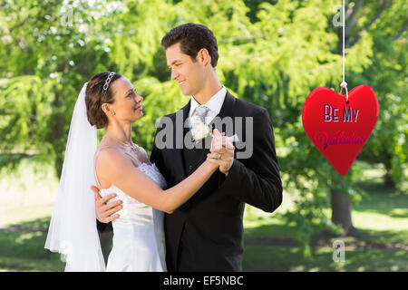 Immagine composita della coppia danzante sul giorno di nozze Foto Stock