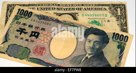 Yen giapponese e dollaro Usa Banconote Foto Stock