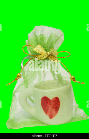 Buste regalo traslucido a forma di cuore tazza da caffè. Foto Stock