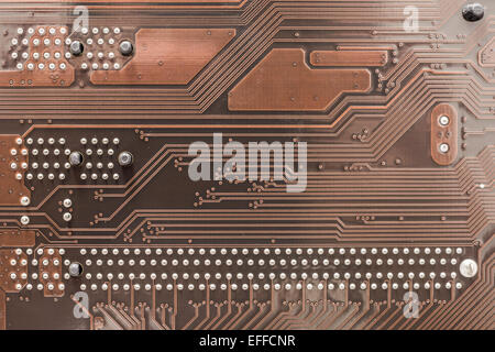 Scheda di circuito texture e i pin sulla scheda madre del computer Foto Stock