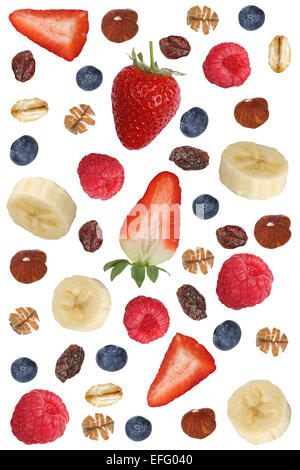 Muesli frutta ingredienti per la prima colazione con frutta come lampone, mirtilli, banana e fragola Foto Stock