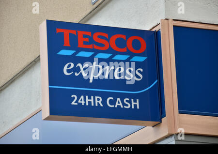 Tesco Express 24 ora segno di cassa, London, Regno Unito Foto Stock