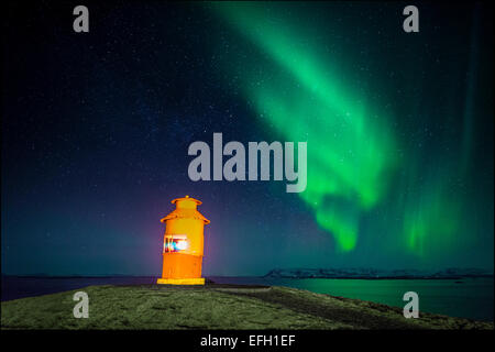 Faro e l'Aurora Boreale, Snaefellsnes Peninsula, Islanda Foto Stock