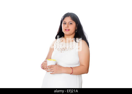 1 indian gravidanza della donna di bere il caffè Foto Stock