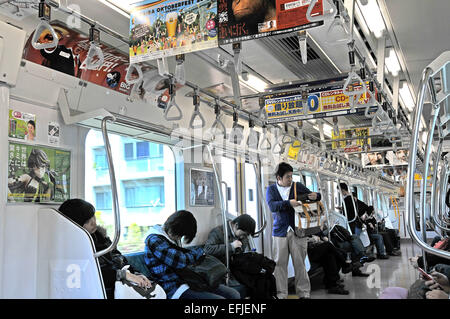 Treni pendolari Tokyo Giappone Foto Stock